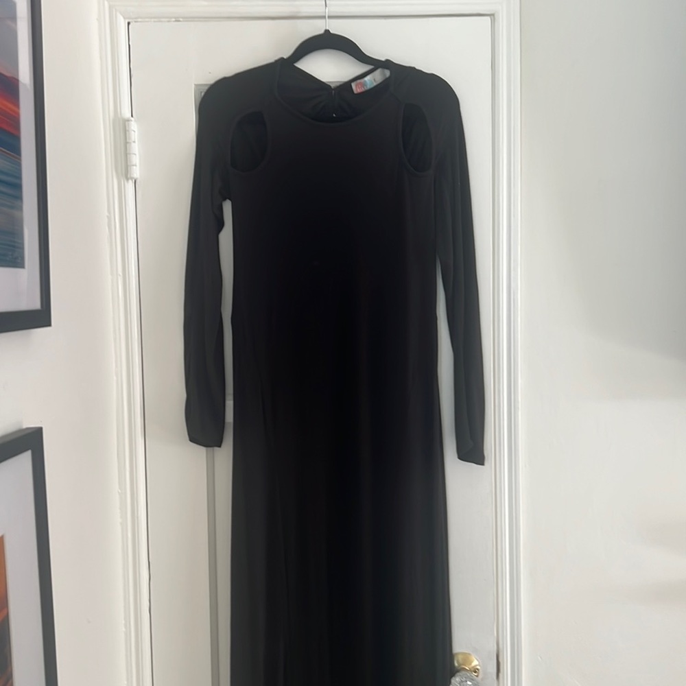 Free People Jersey maxi dress with shoulder cut out and circular ope back.